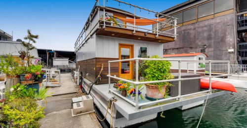 Knot Home Houseboat Offers Exposed Grain and Waterfront Decks