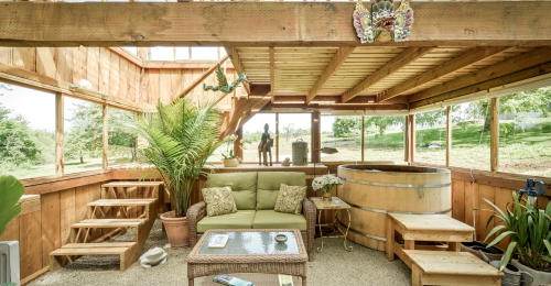 This Beautifully Converted Cedar Greenhouse Cabin Is Perfect for You