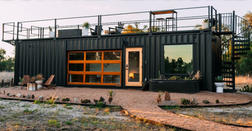 Minimalist Shipping Container Home With Rooftop Bathtub!