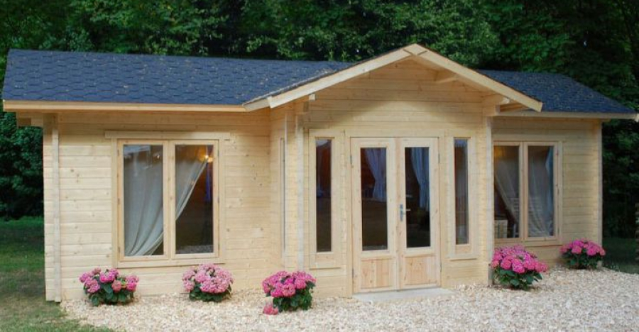 Check Out This Cute Cozy Courtyard Cabin Kit for $22,000