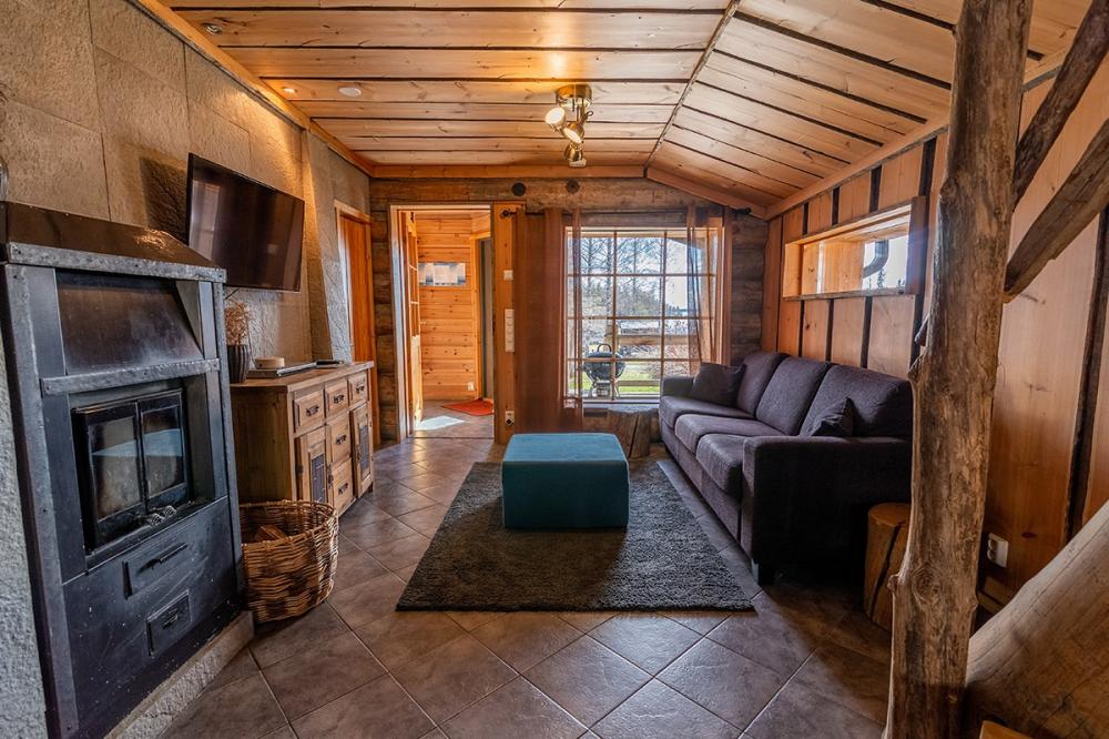 See The Rustic Interior Of This 2 Bedroom Log Cabin