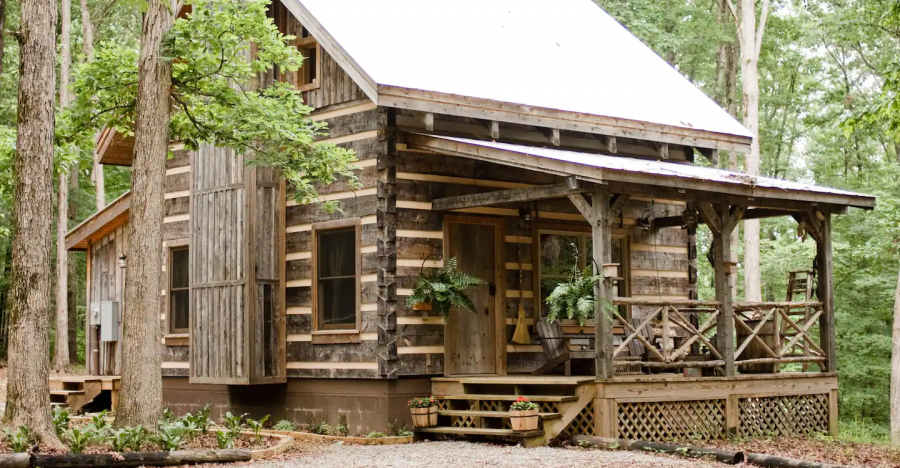 Take a Peek Inside This Small Log Cabin With Nice Porch